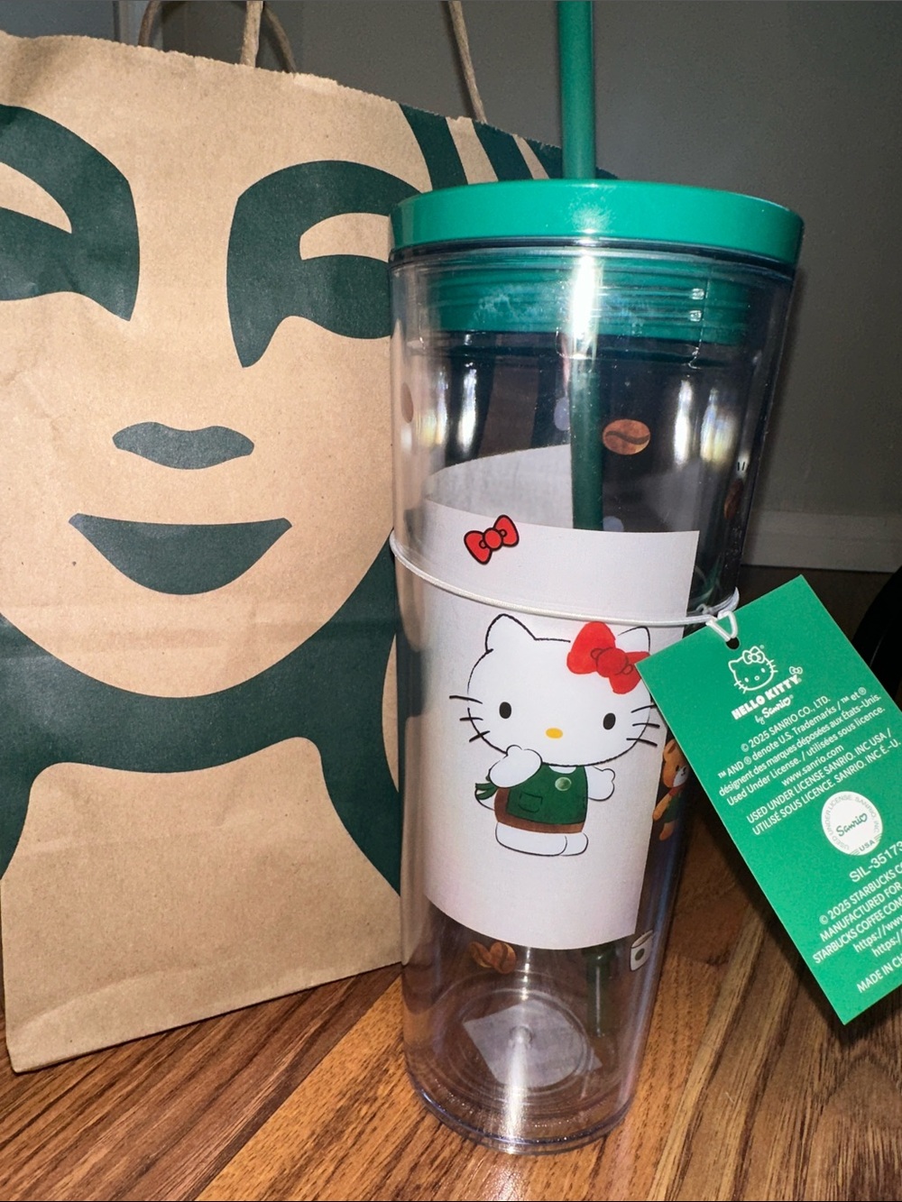 Starbucks Clear Tumbler with Green Lid and Hello Kitty Artwork